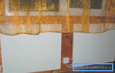 Amatőr fotó, elektromos fűtőberendezések, kerámia betétekkel ellátott panelek formájában Amatőr fotó, elektromos fűtőberendezések, kerámia betétekkel ellátott panelek formájában