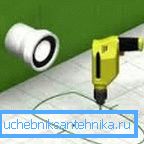 A fúrás gondosan történik, hogy ne sérüljön a csempe.